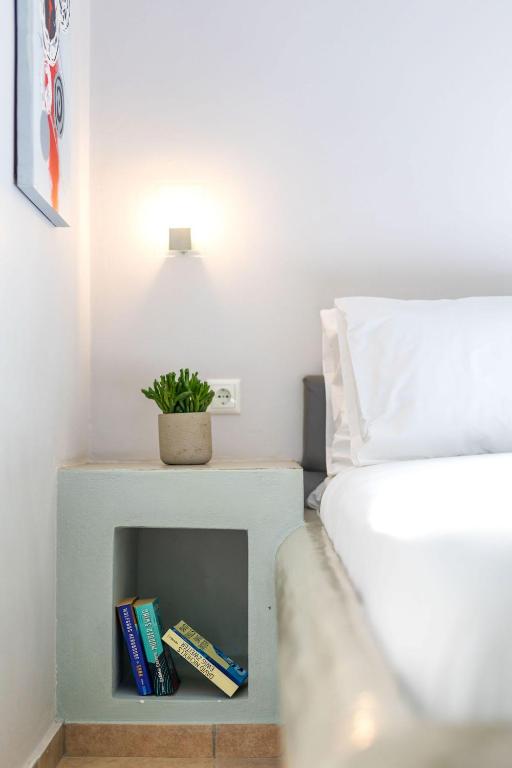 Postel nebo postele na pokoji v ubytování Sahara Beach Apartments - Kastraki