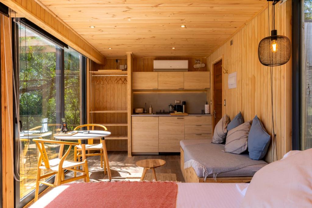 Posezení v ubytování OUTSCAPE l Cabañas Lago Puyehue
