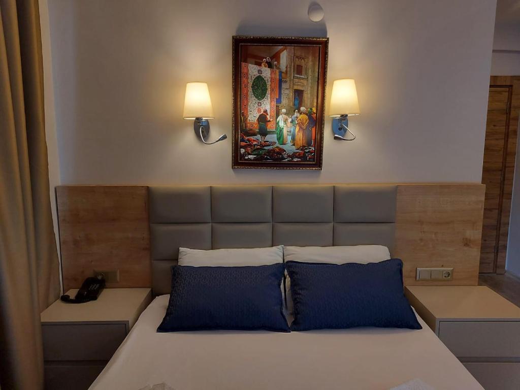 Postel nebo postele na pokoji v ubytování Afsin Hotel