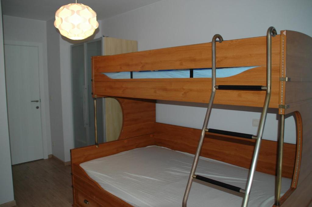 Postel nebo postele na pokoji v ubytování Greens 251