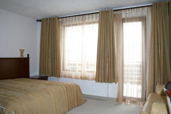 Postel nebo postele na pokoji v ubytování Guest House Chicho Tsane