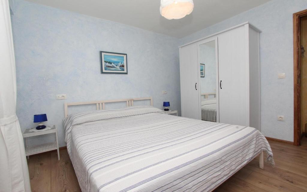Posteľ alebo postele v izbe v ubytovaní Apartments Midea 2