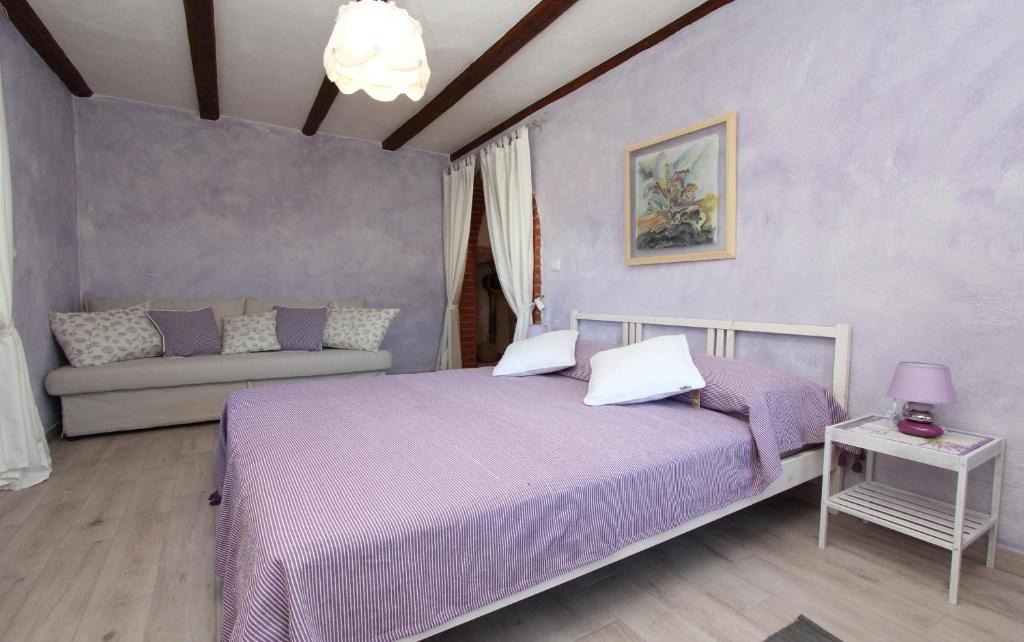 Posteľ alebo postele v izbe v ubytovaní Apartments Midea 2