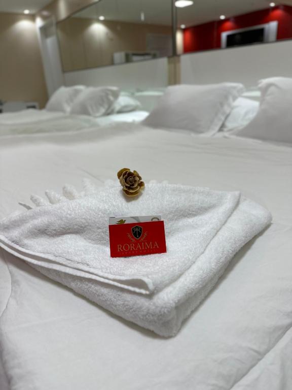 Postel nebo postele na pokoji v ubytování Roraima Apart Hotel