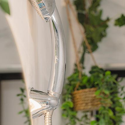 a wine glass sitting on a table with a plant at Noddle Sun Stay in Seoul