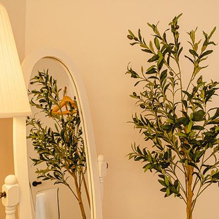 a bathroom with a mirror and a plant at Noddle Sun Stay in Seoul