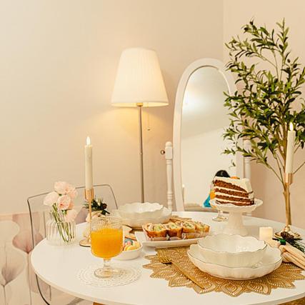 a table with food and a mirror in a room at Noddle Sun Stay in Seoul