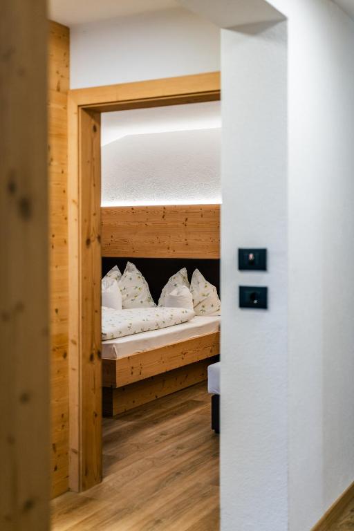 Postel nebo postele na pokoji v ubytování Garni Edera