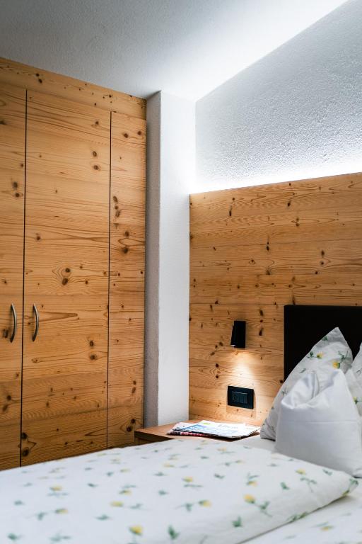 Postel nebo postele na pokoji v ubytování Garni Edera