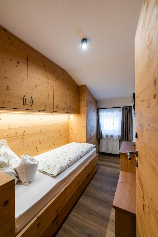Postel nebo postele na pokoji v ubytování Garni Edera
