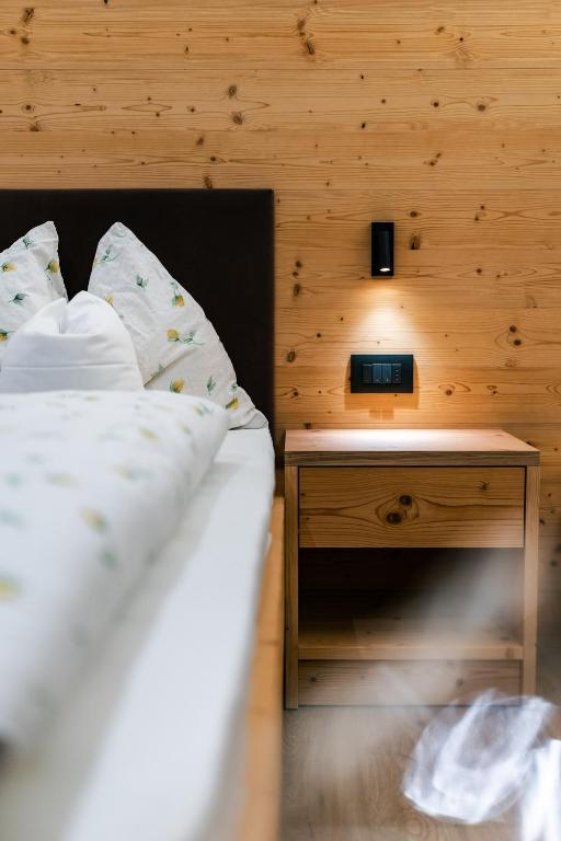 Postel nebo postele na pokoji v ubytování Garni Edera