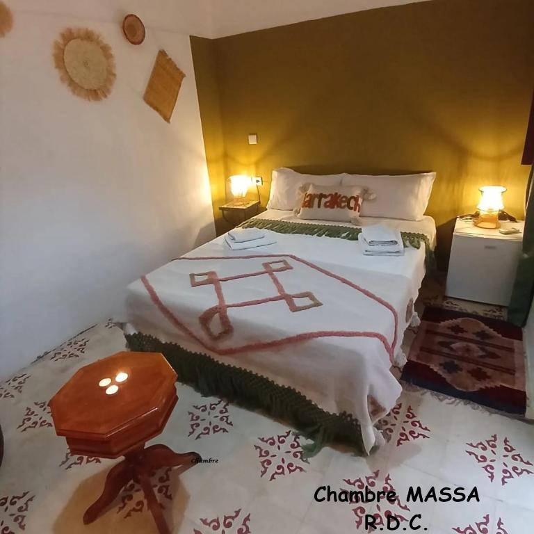 Postel nebo postele na pokoji v ubytování Riad Dantella