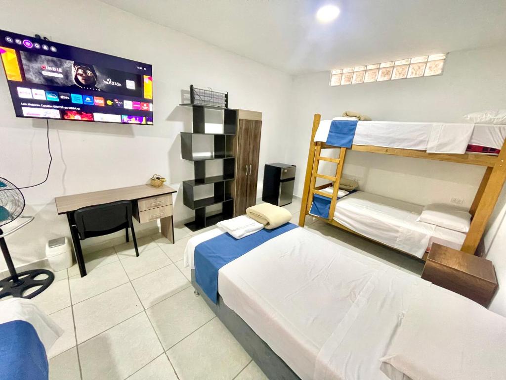 Postel nebo postele na pokoji v ubytování Casa Pacasmayo
