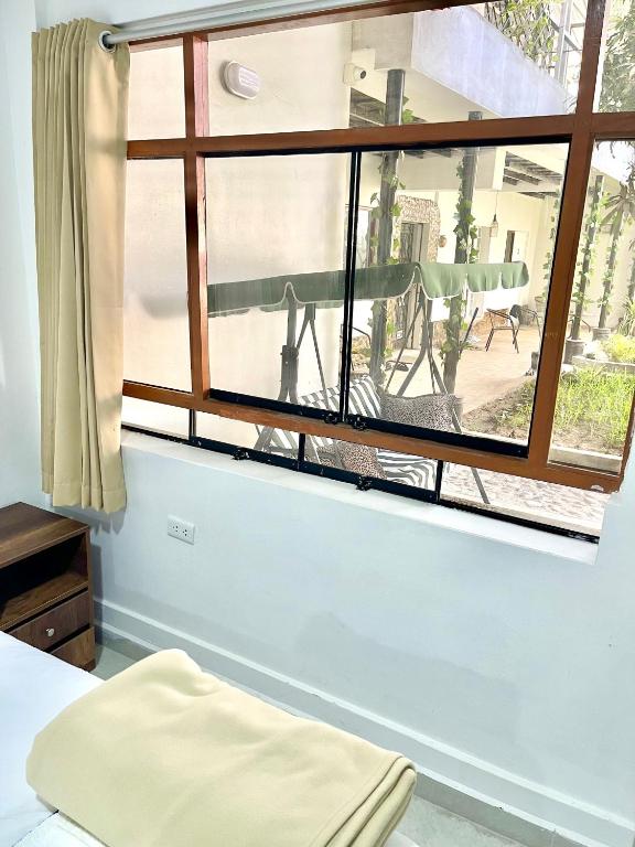 Postel nebo postele na pokoji v ubytování Casa Pacasmayo