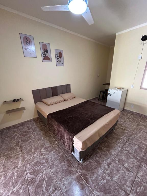 Postel nebo postele na pokoji v ubytování Suite dos anjos