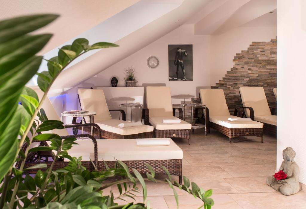 Posezení v ubytování Radisson Blu Hotel Halle-Merseburg