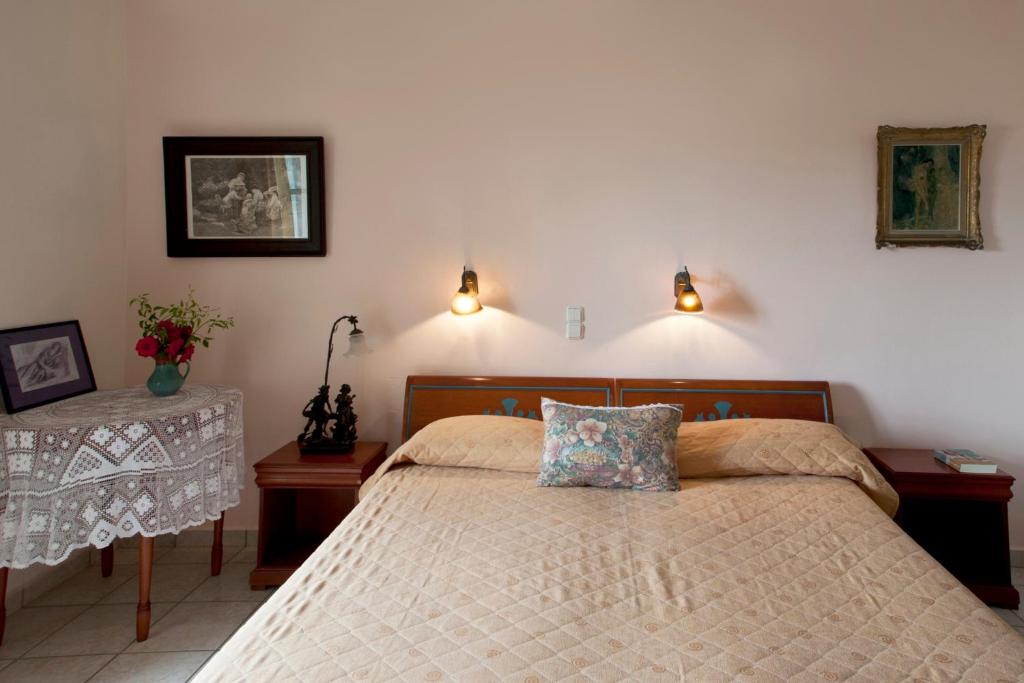 Postel nebo postele na pokoji v ubytování Apollon Hotel
