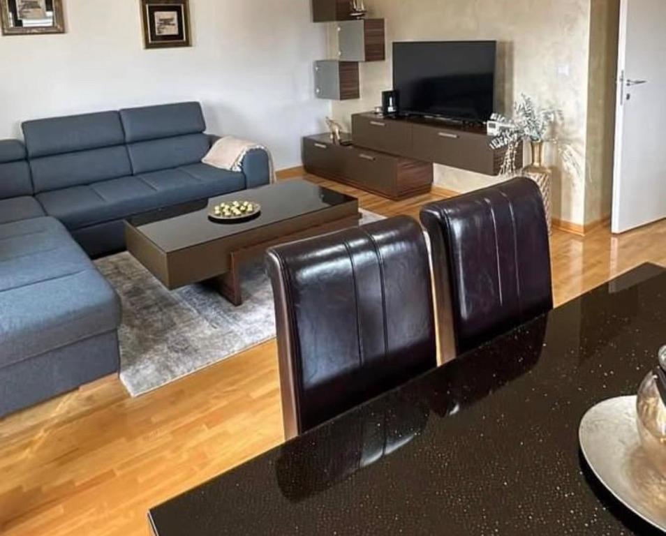 TV a/nebo společenská místnost v ubytování L&D apartman