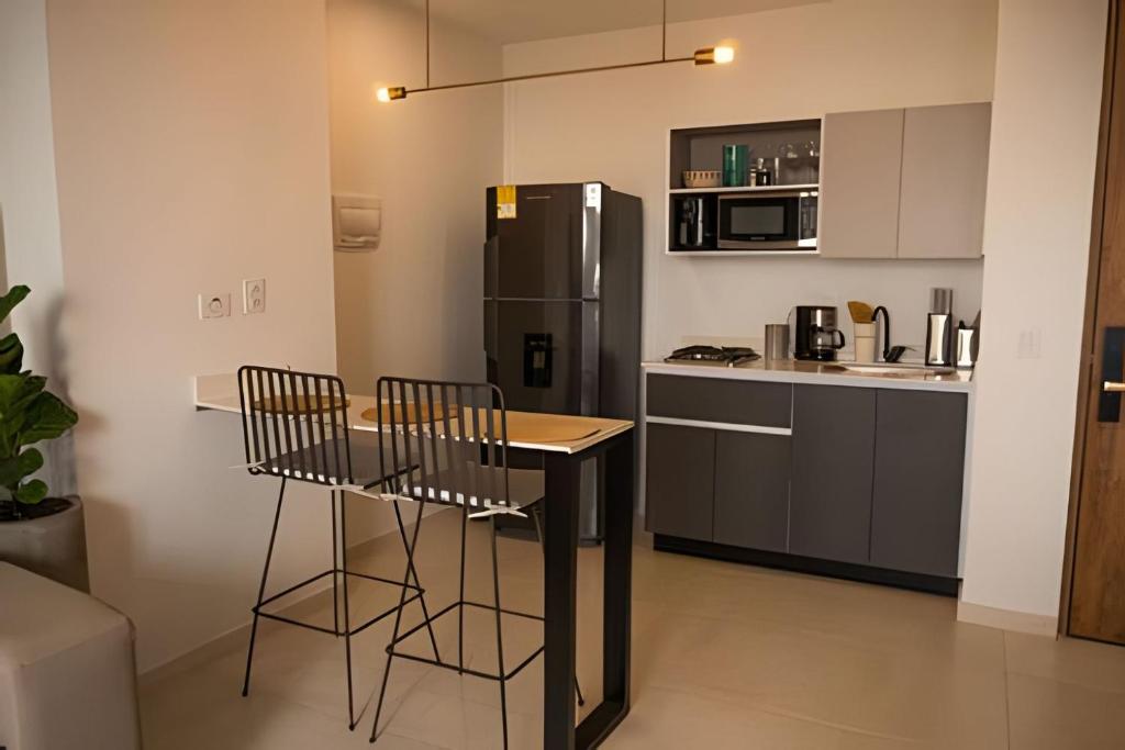 Kuchyň nebo kuchyňský kout v ubytování Torre de Apartasuites Centro Comercial Cerritos Mall