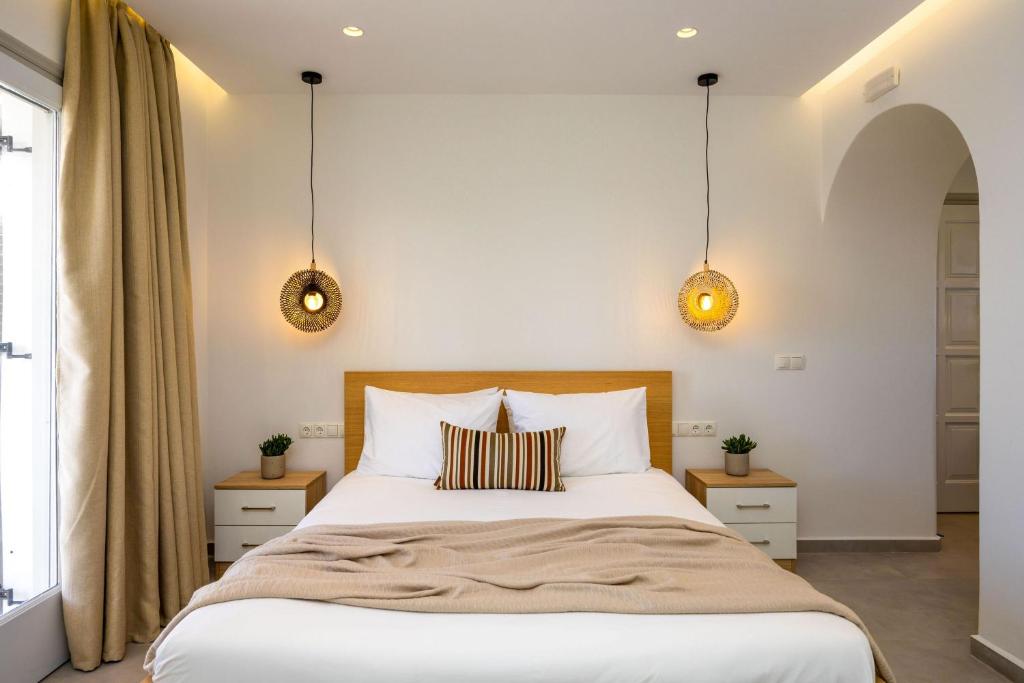 Postel nebo postele na pokoji v ubytování Sahara Beach Apartments - Kastraki