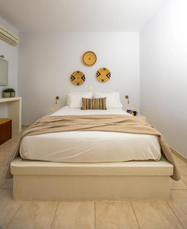 Postel nebo postele na pokoji v ubytování Sahara Beach Apartments - Kastraki