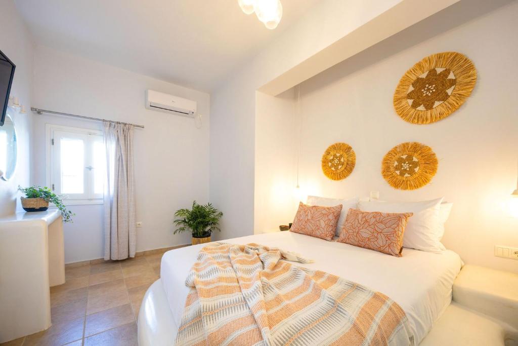 Postel nebo postele na pokoji v ubytování Sahara Beach Apartments - Kastraki