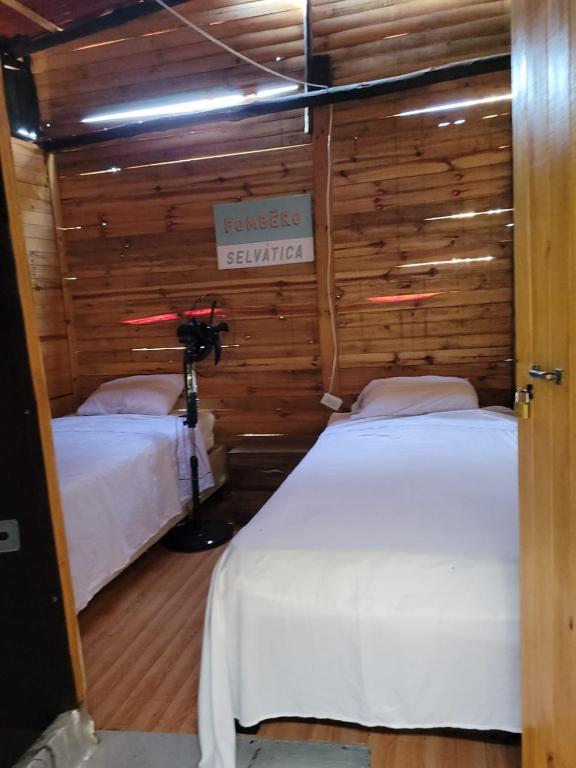 Postel nebo postele na pokoji v ubytování Eco hotel Mar De Ensueño