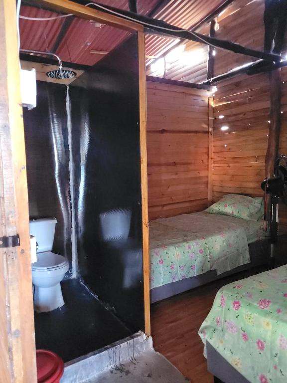 Postel nebo postele na pokoji v ubytování Eco hotel Mar De Ensueño