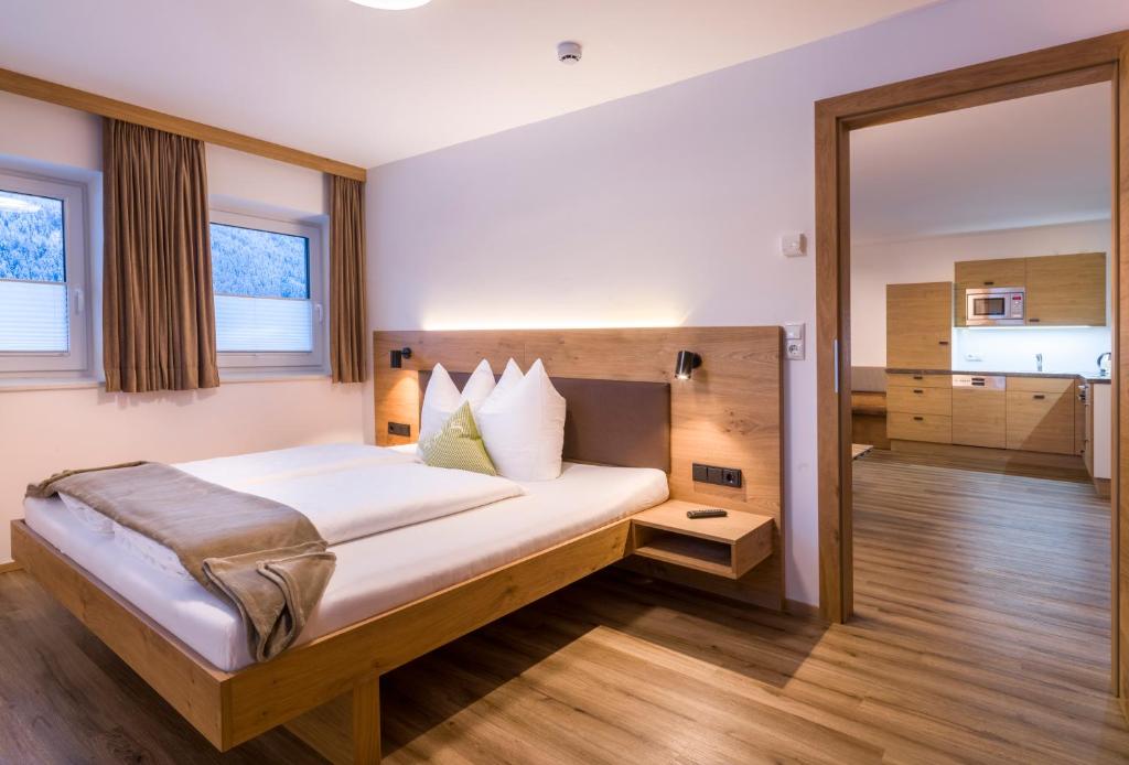 Postel nebo postele na pokoji v ubytování Haus Bstieler