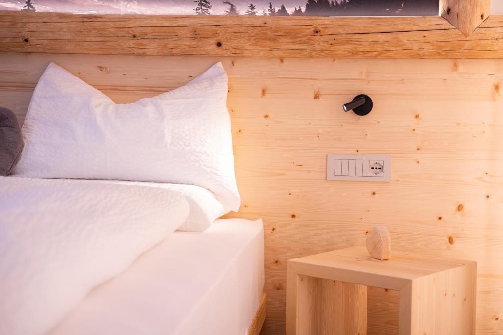Postel nebo postele na pokoji v ubytování Residence Lavina