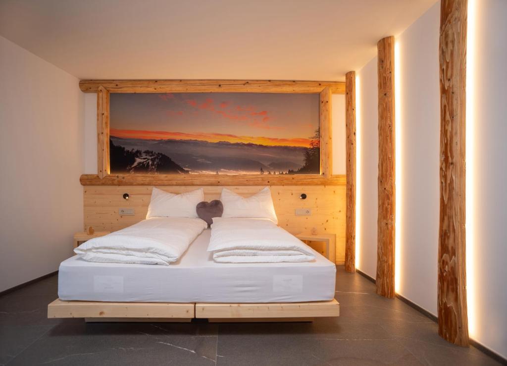 Postel nebo postele na pokoji v ubytování Residence Lavina