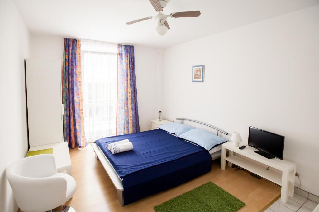 Posteľ alebo postele v izbe v ubytovaní Friendly People's Guest House