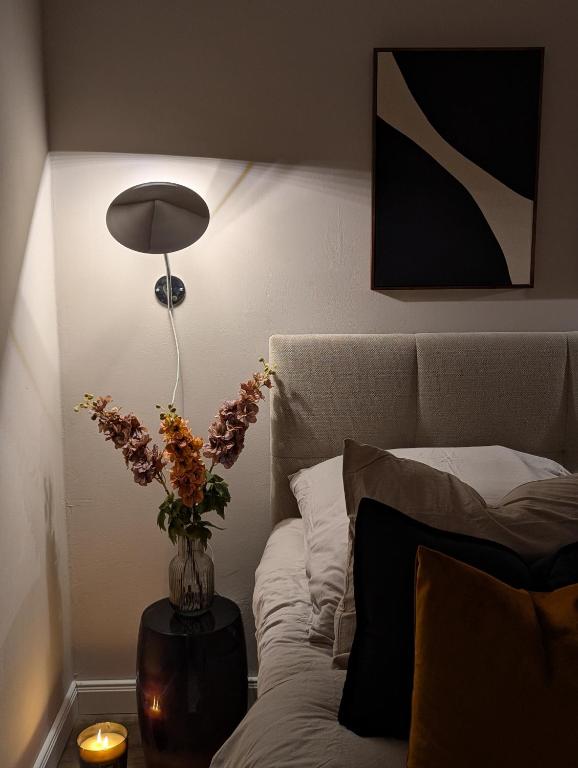 Postel nebo postele na pokoji v ubytování Moderne Wohnung mit Seeblick