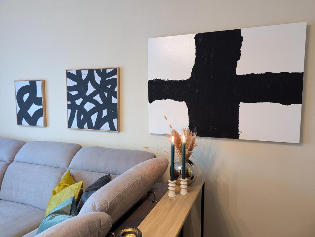 Posezení v ubytování Moderne Wohnung mit Seeblick