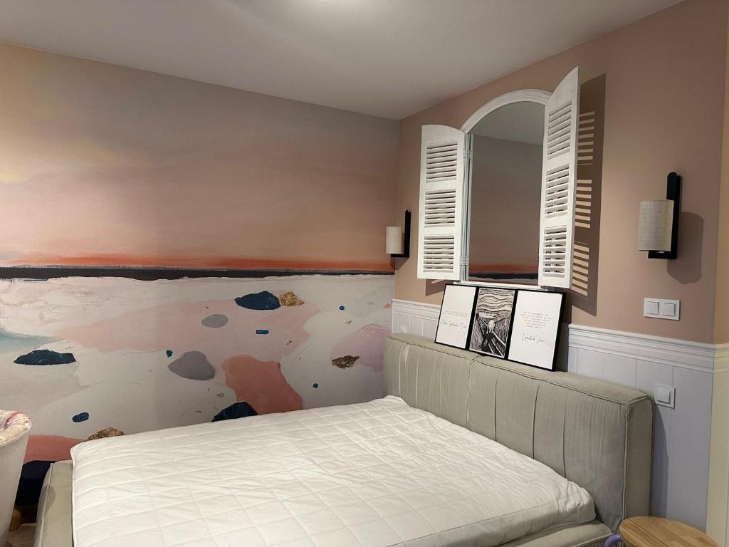 Postel nebo postele na pokoji v ubytování Apartament na Wzgórzu Piaskowy