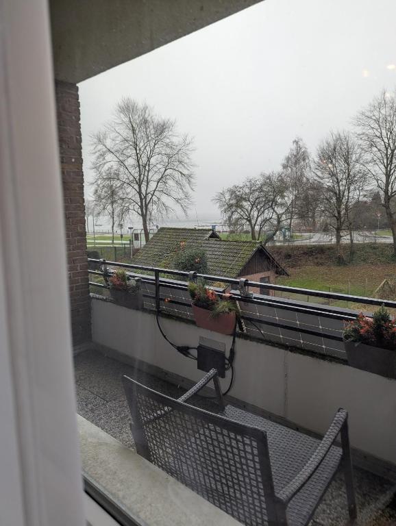 Balkón nebo terasa v ubytování Moderne Wohnung mit Seeblick