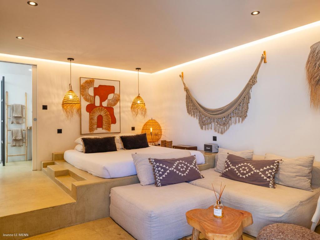 Posezení v ubytování Le Bungalow Gypset