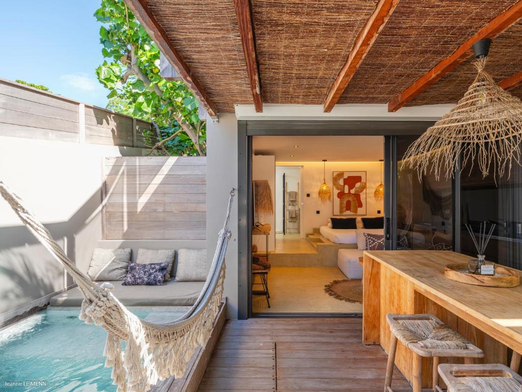 Posezení v ubytování Le Bungalow Gypset