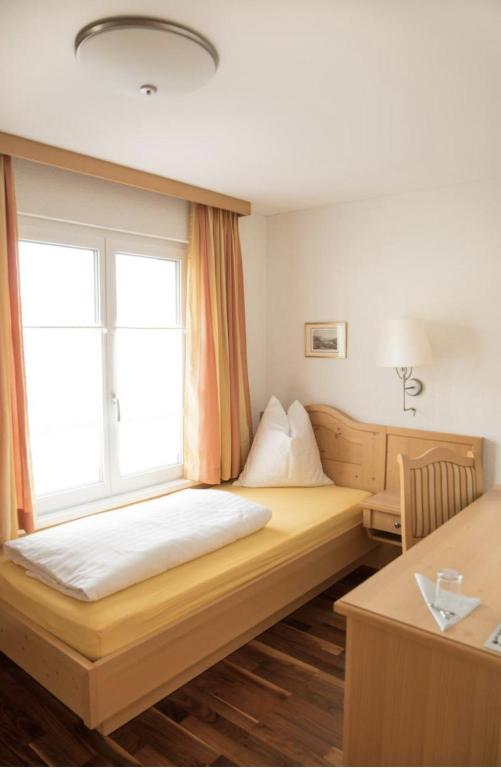Postel nebo postele na pokoji v ubytování Haus Engel Gams
