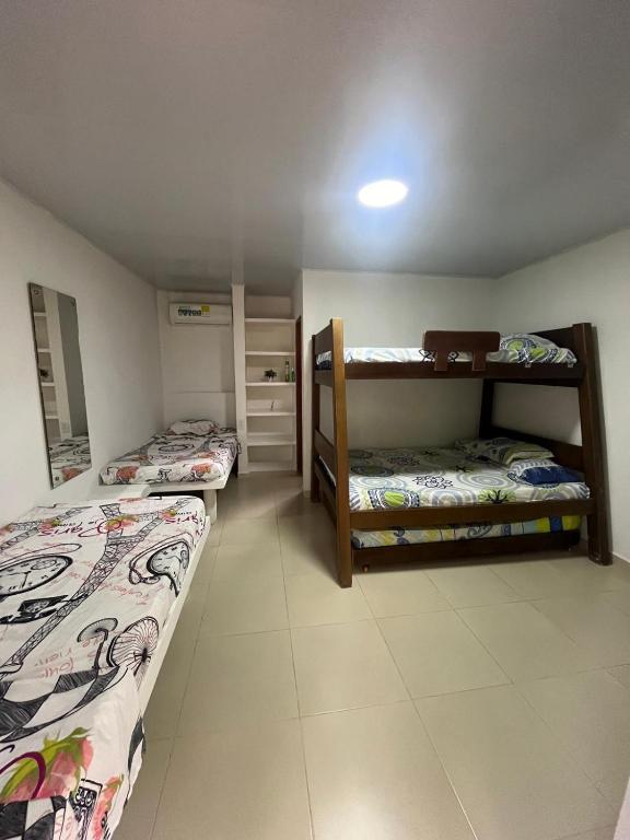 Voodi või voodid majutusasutuse Hotel Heliopolis toas