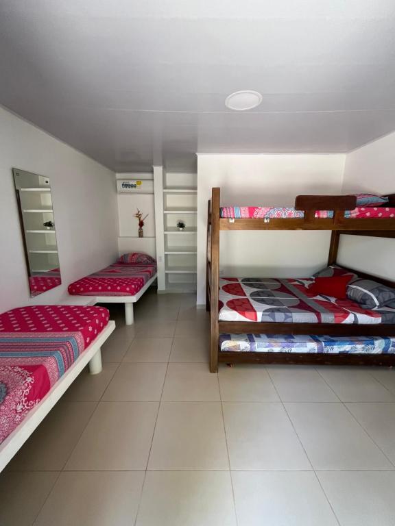 Voodi või voodid majutusasutuse Hotel Heliopolis toas