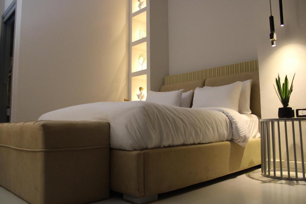 Postel nebo postele na pokoji v ubytování Elite Hotel