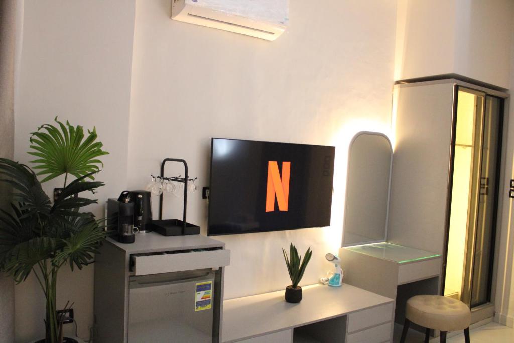 TV a/nebo společenská místnost v ubytování Elite Hotel