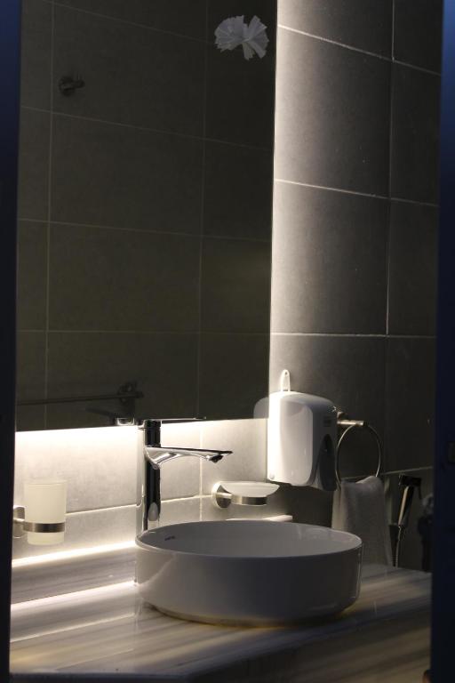 Koupelna v ubytování Elite Hotel