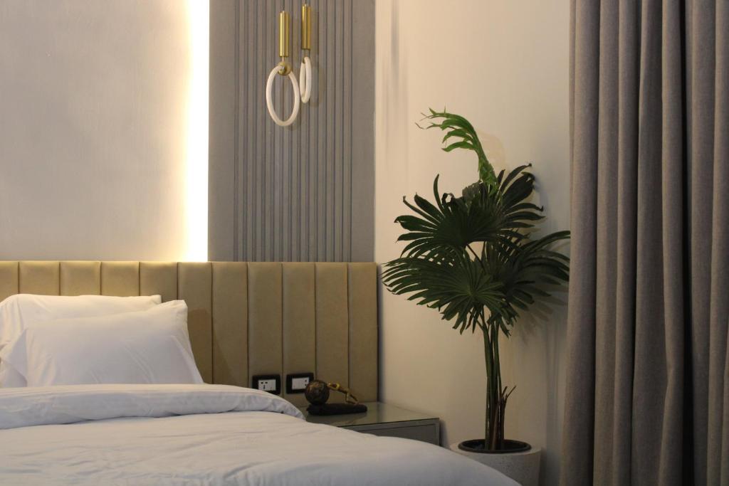 Postel nebo postele na pokoji v ubytování Elite Hotel