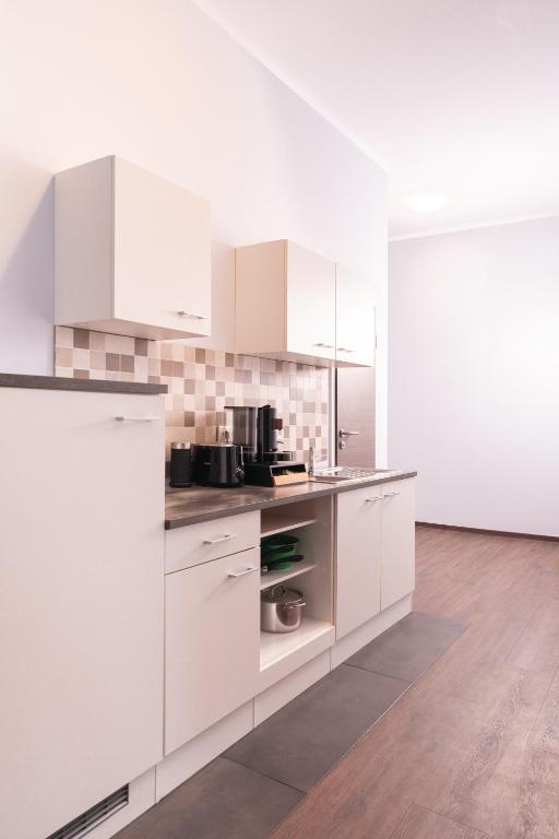 UNEA Aparthotel in Leipzig - Vollausgestattete Apartments - Doppelzimmer Mit Gemeinschaftsbad