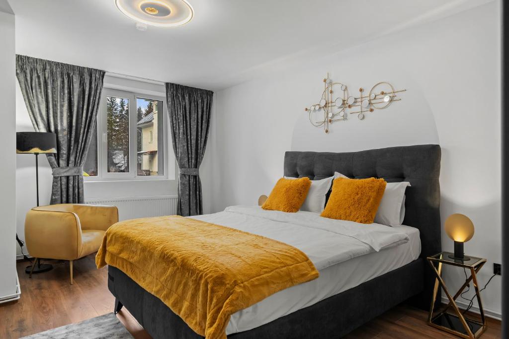 Postel nebo postele na pokoji v ubytování SEVEN Apartments
