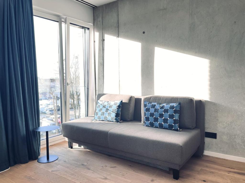 Ein Sitzbereich in der Unterkunft Mikes Apartments Munich