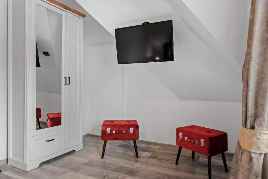 TV a/nebo společenská místnost v ubytování SEVEN Apartments