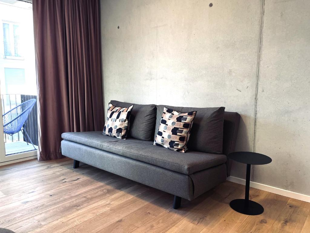 Ein Sitzbereich in der Unterkunft Mikes Apartments Munich